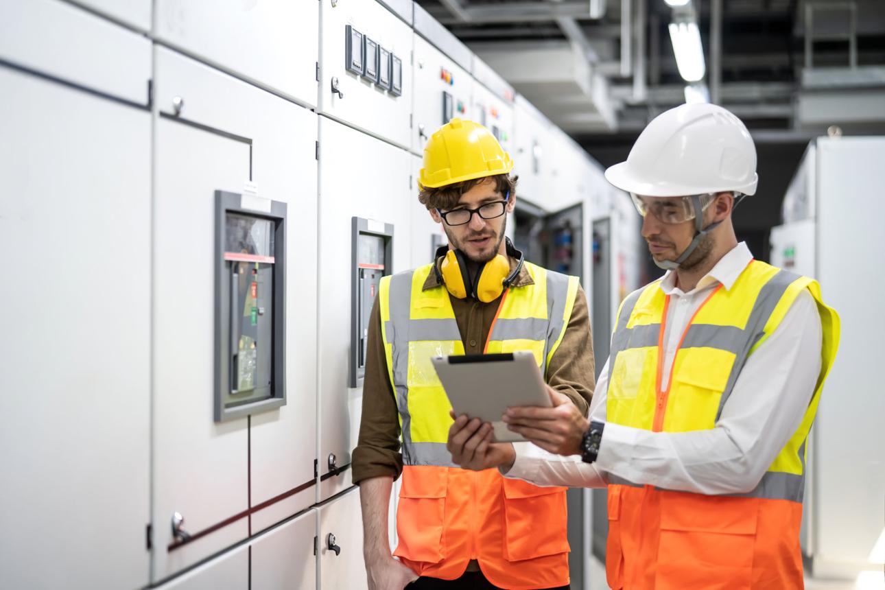 Engineers inspecting electrical infrastructure